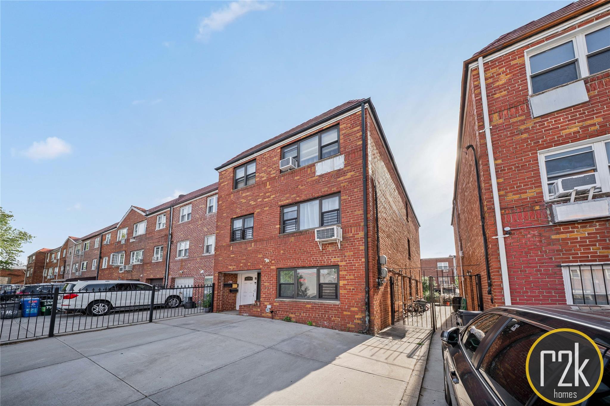 32-24 75th Street Queens, NY 11370 - Photo 1 of 16 a view of a building with many windows