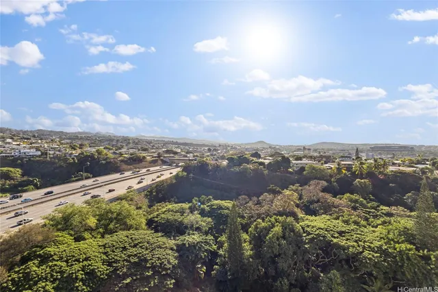 an aerial view of city and lake