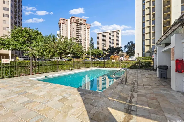 a view of a patio with a yard