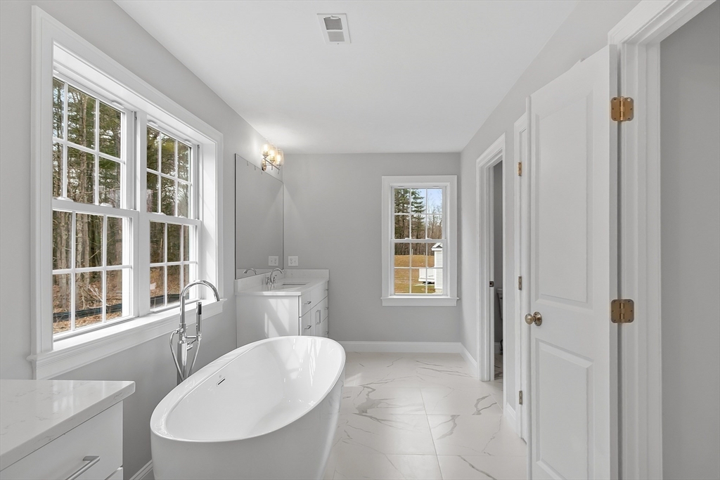 7 Robinson Road Pepperell, MA 01463 - Photo 28 of 30 a bathroom with a sink toilet and shower