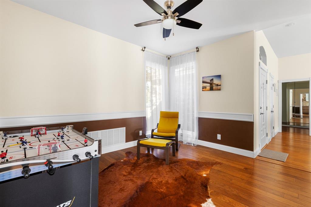 2609 Castle Road Burleson, TX 76028 - Photo 6 of 25 a living room with furniture and a rug