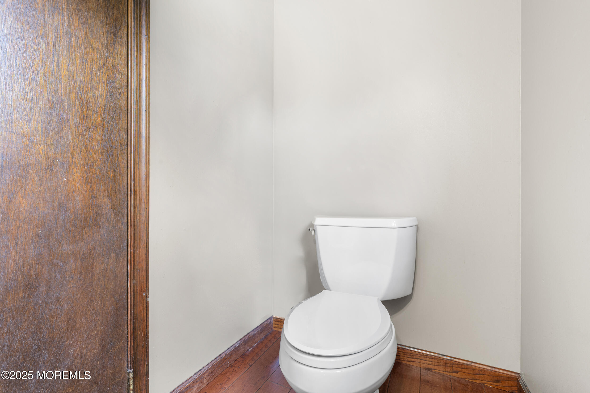 444 Pfister Road Jackson, NJ 08527 - Photo 18 of 40 a white toilet sitting next to a shower