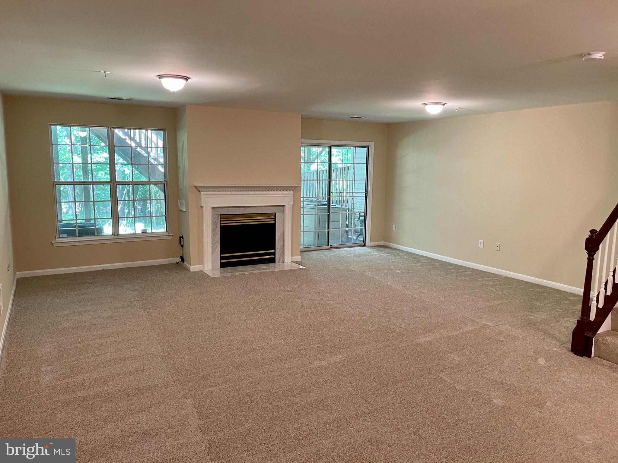 2425 Copper Mountain Terrace Silver Spring, MD 20906 - Photo 22 of 27 Basement w/ Fireplace and Living Area