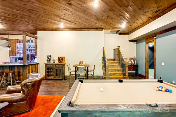 a view of a swimming pool with seating area