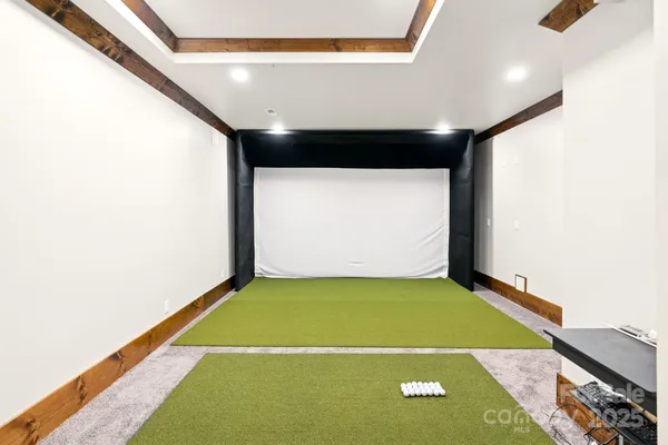 a view of an empty room with windows