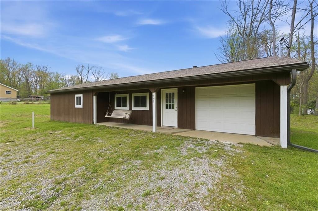 261 Hilltop Acres Road Slippery Rock, PA 16057 - Photo 1 of 35 a view of a house with a yard
