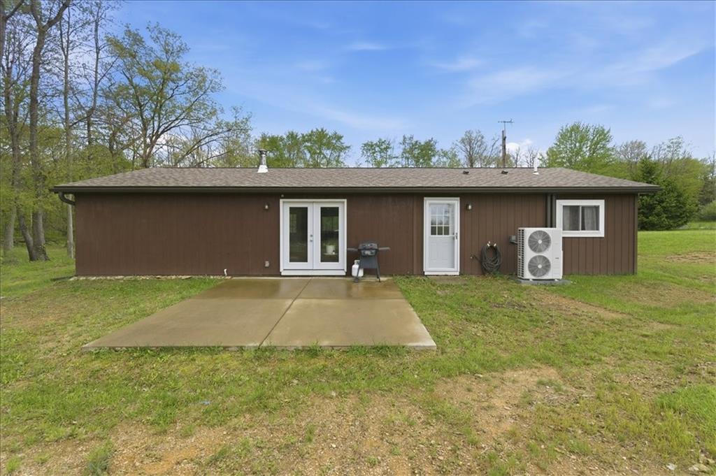 261 Hilltop Acres Road Slippery Rock, PA 16057 - Photo 24 of 35 a front view of a house with garden