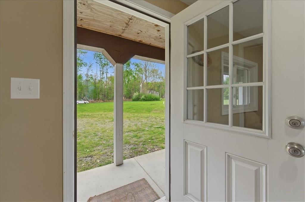 261 Hilltop Acres Road Slippery Rock, PA 16057 - Photo 6 of 35 a view of a glass door
