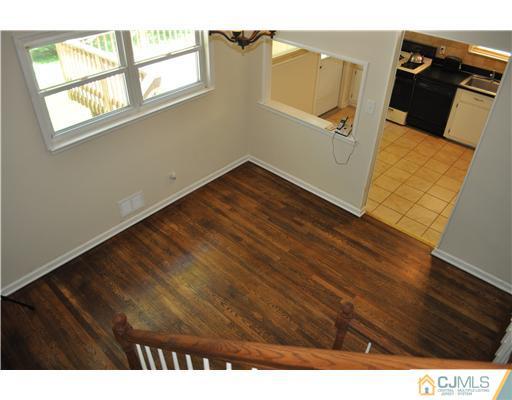 16 Donald Road East Brunswick, NJ 08816 - Photo 11 of 25 a view of a living room with a wooden floor