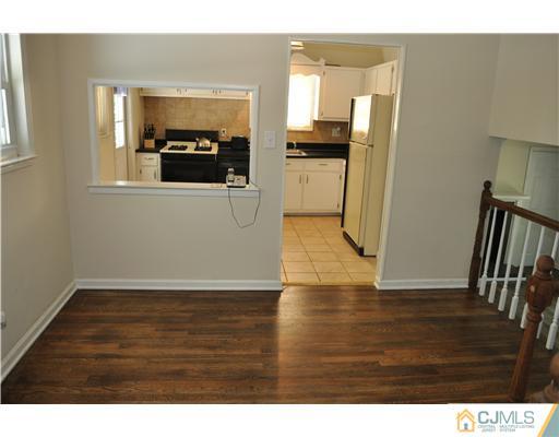 16 Donald Road East Brunswick, NJ 08816 - Photo 12 of 25 a view of a living room with wooden floor