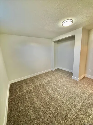 an empty room with a workbench