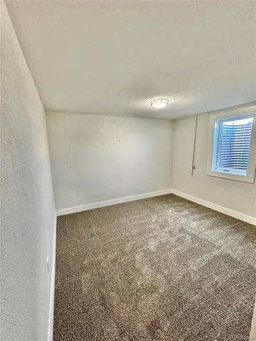 an empty room with a natural light