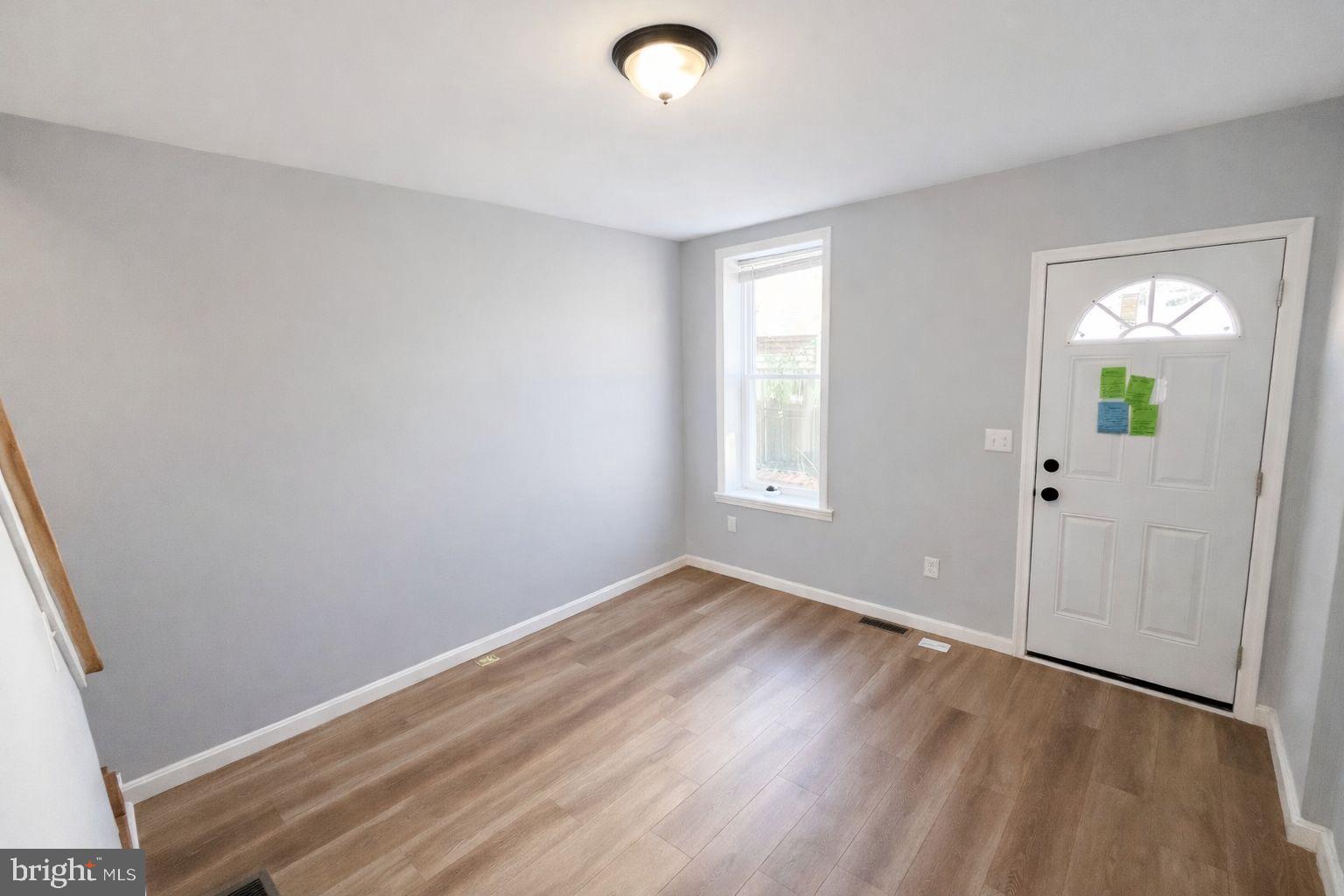 510 North Duncan Street Baltimore, MD 21205 - Photo 2 of 8 an empty room with windows