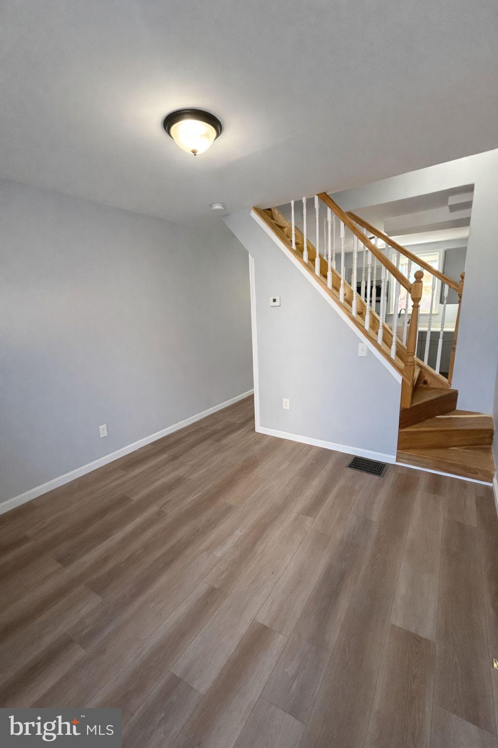 510 North Duncan Street Baltimore, MD 21205 - Photo 3 of 8 a view of an entryway with wooden floor