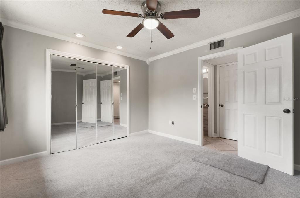 5929 Windhover Drive, Unit A02 Orlando, FL 32819 - Photo 10 of 17 a view of an empty room