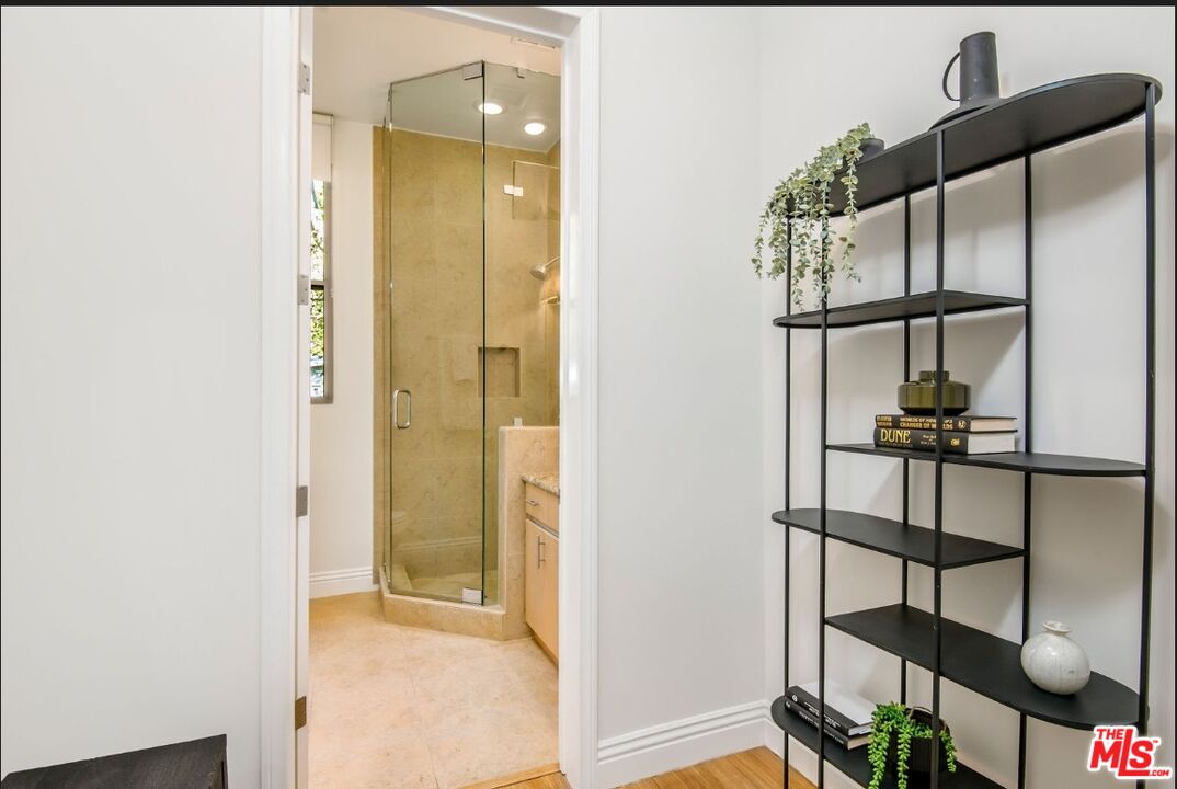 3685 Mandeville Canyon Road Los Angeles, CA 90049 - Photo 15 of 24 a view of a hallway and interior of the house