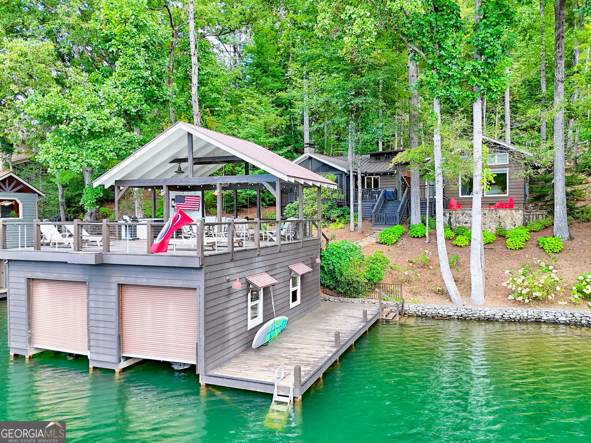 a view of house with garden space and swimming pool
