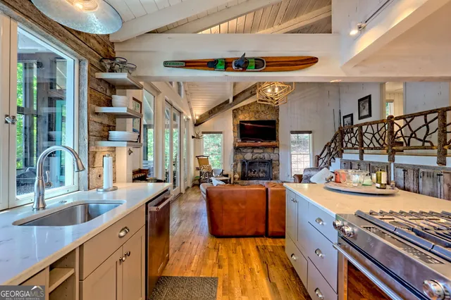 a bedroom with a bed and windows