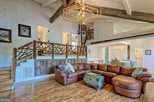a bathroom with a double vanity sink mirror and shower