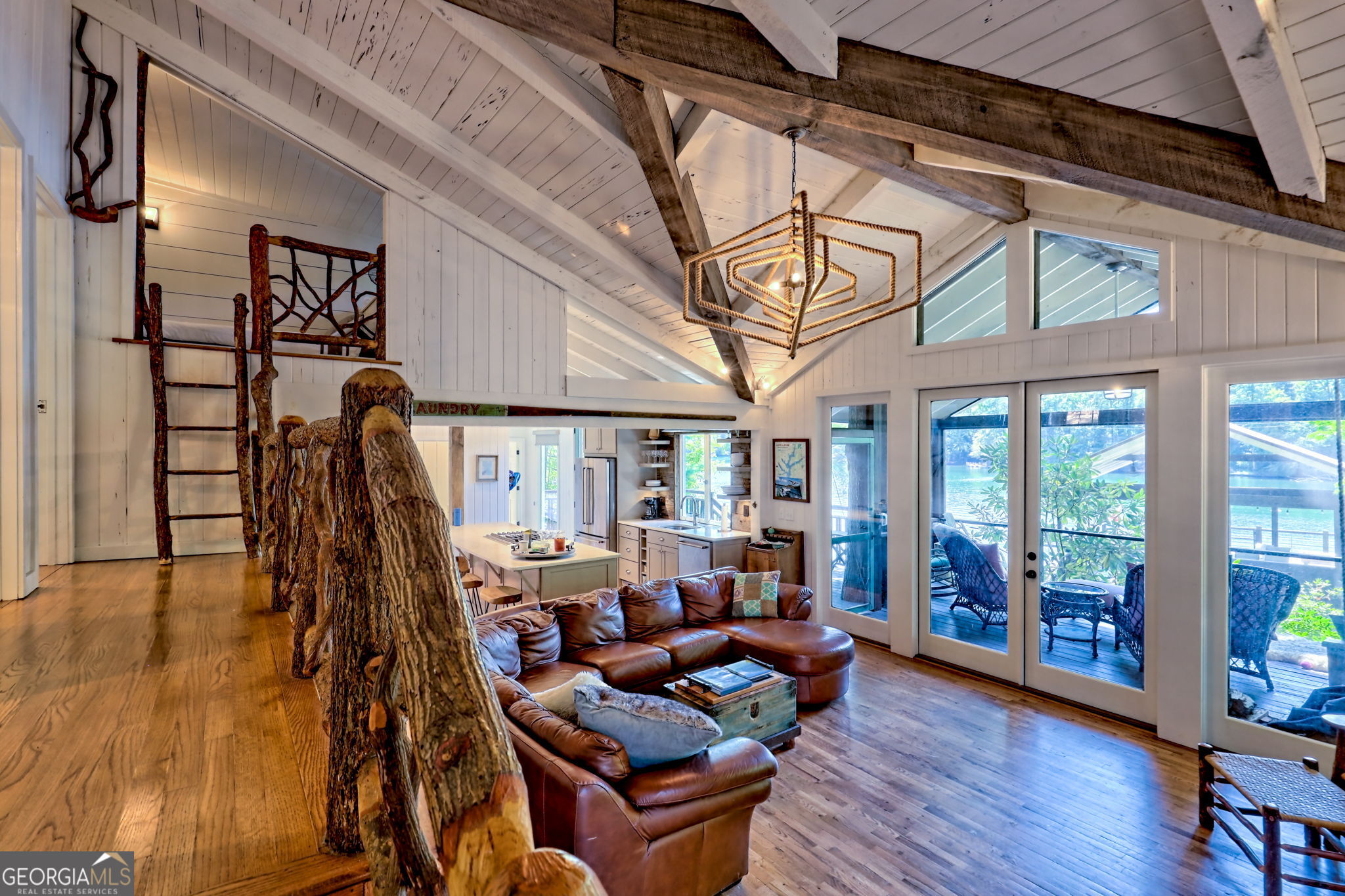 22 Cajun Loop Clayton, GA 30525 - Photo 17 of 87 a living room with furniture a wooden floor and a floor to ceiling window