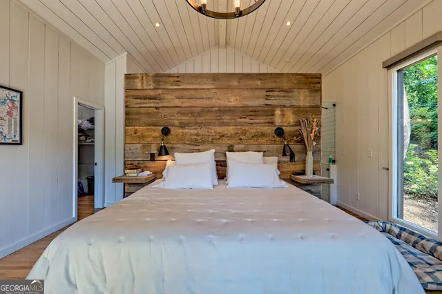 a view of a balcony and car parked