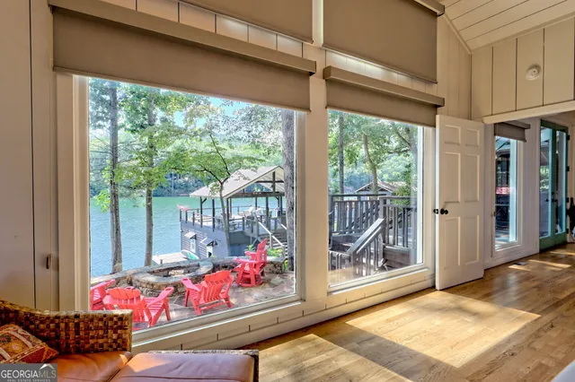 a bedroom with a bed a dresser and a window