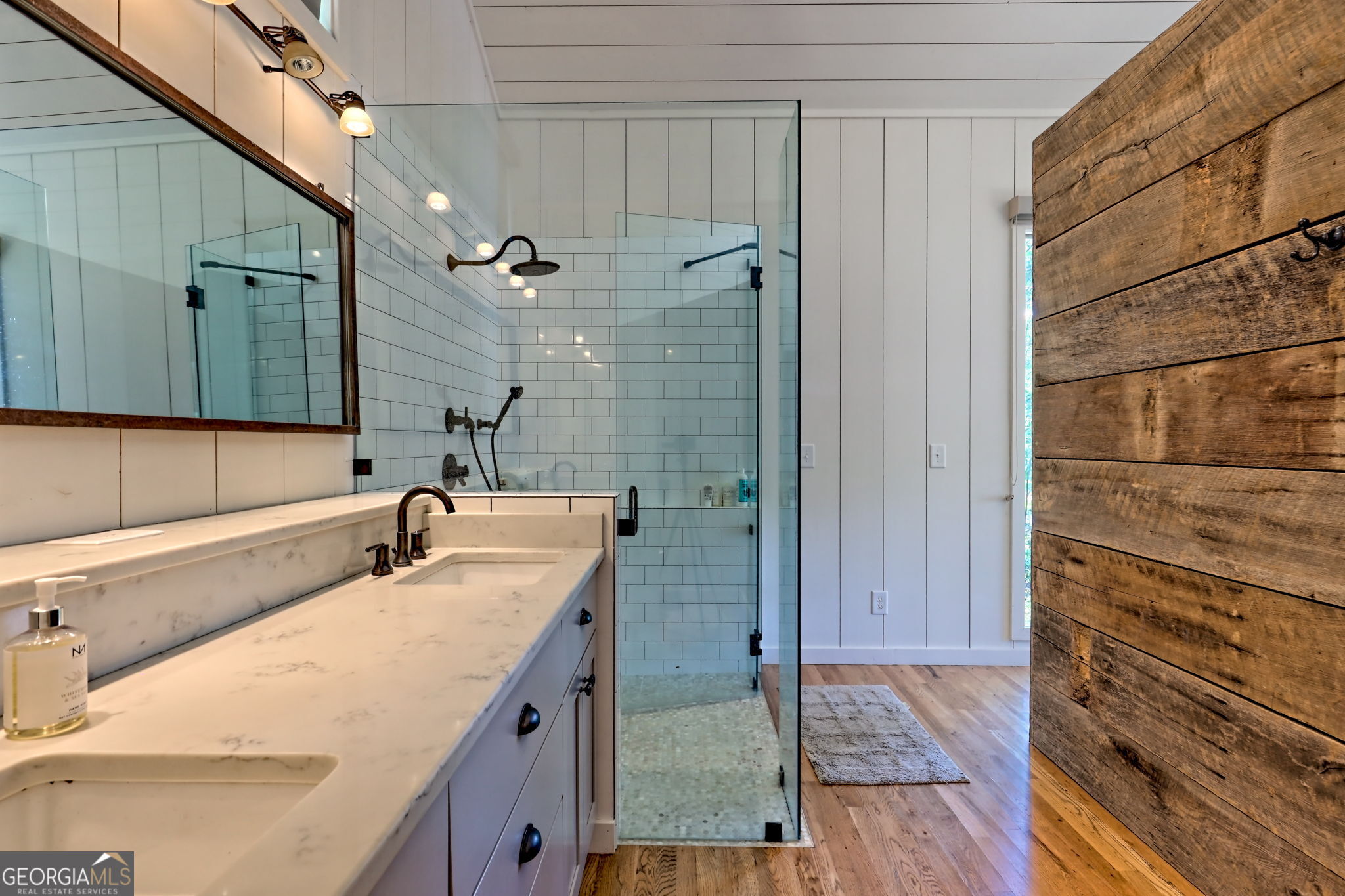 22 Cajun Loop Clayton, GA 30525 - Photo 22 of 87 a bathroom with a sink and a mirror