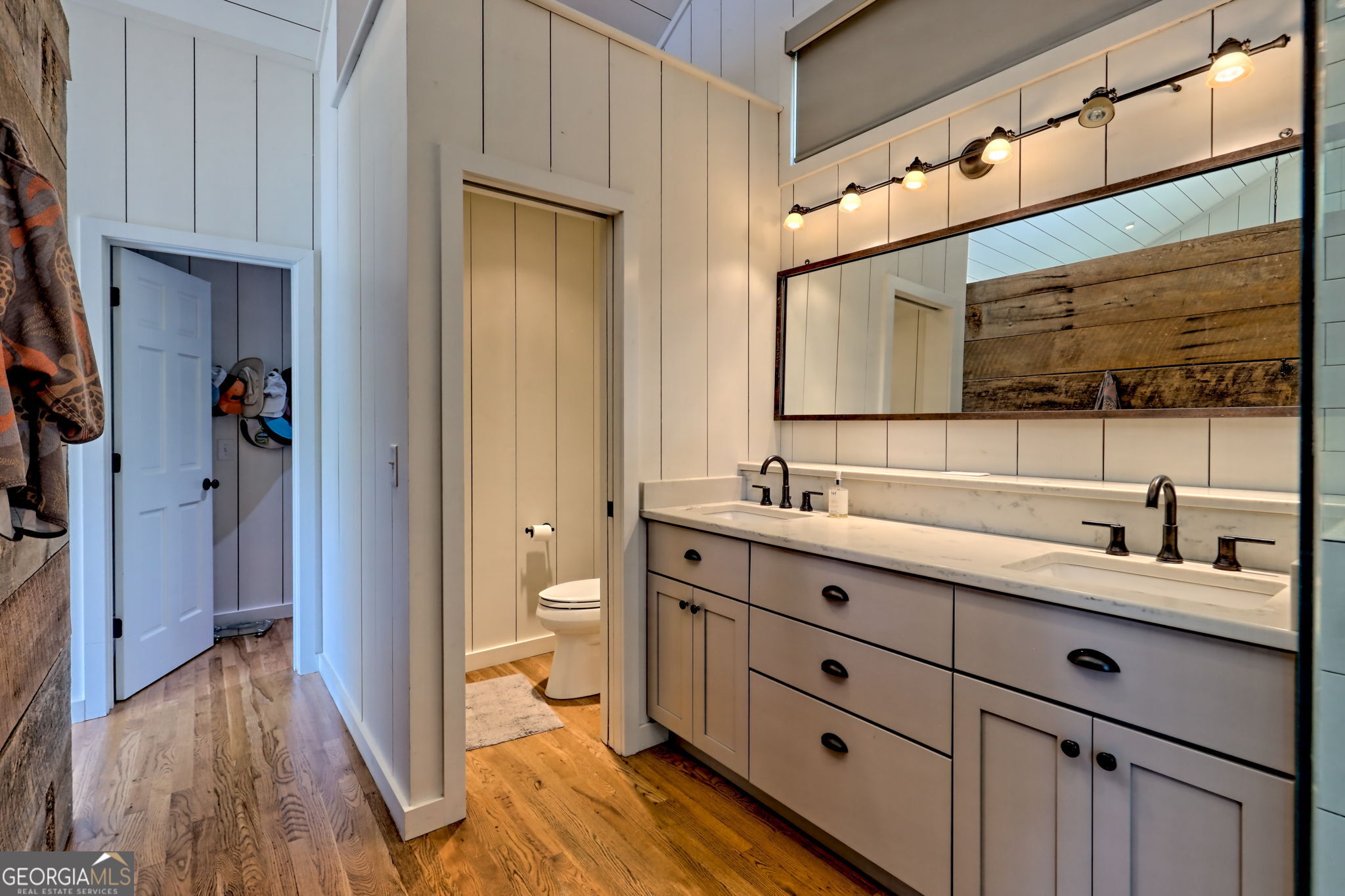 22 Cajun Loop Clayton, GA 30525 - Photo 26 of 87 a bathroom with a double vanity sink and mirror