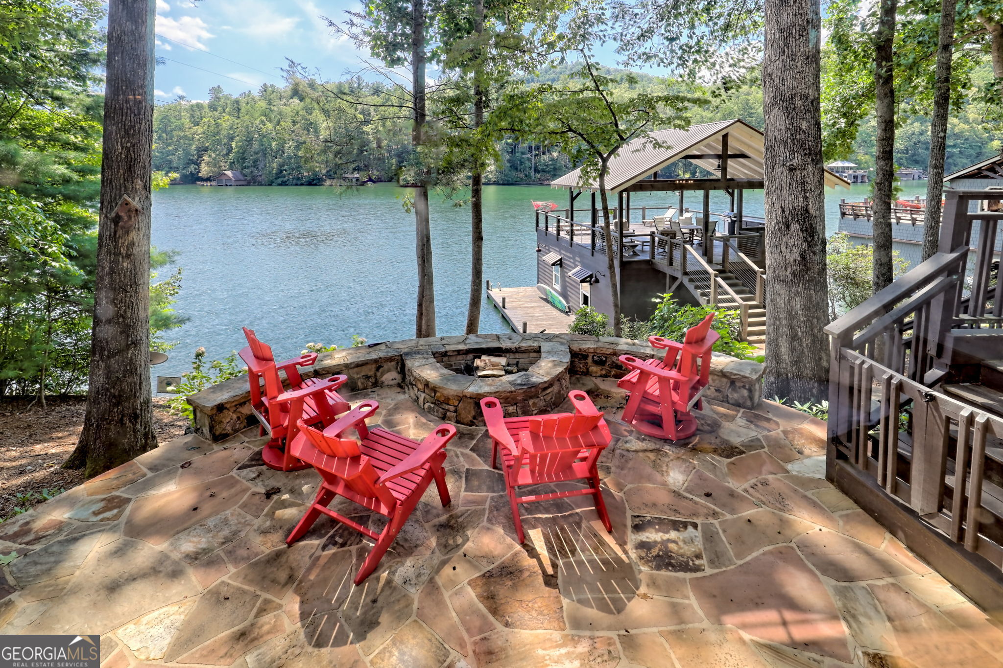 22 Cajun Loop Clayton, GA 30525 - Photo 51 of 87 a view of a patio with table and chairs with wooden floor and fence
