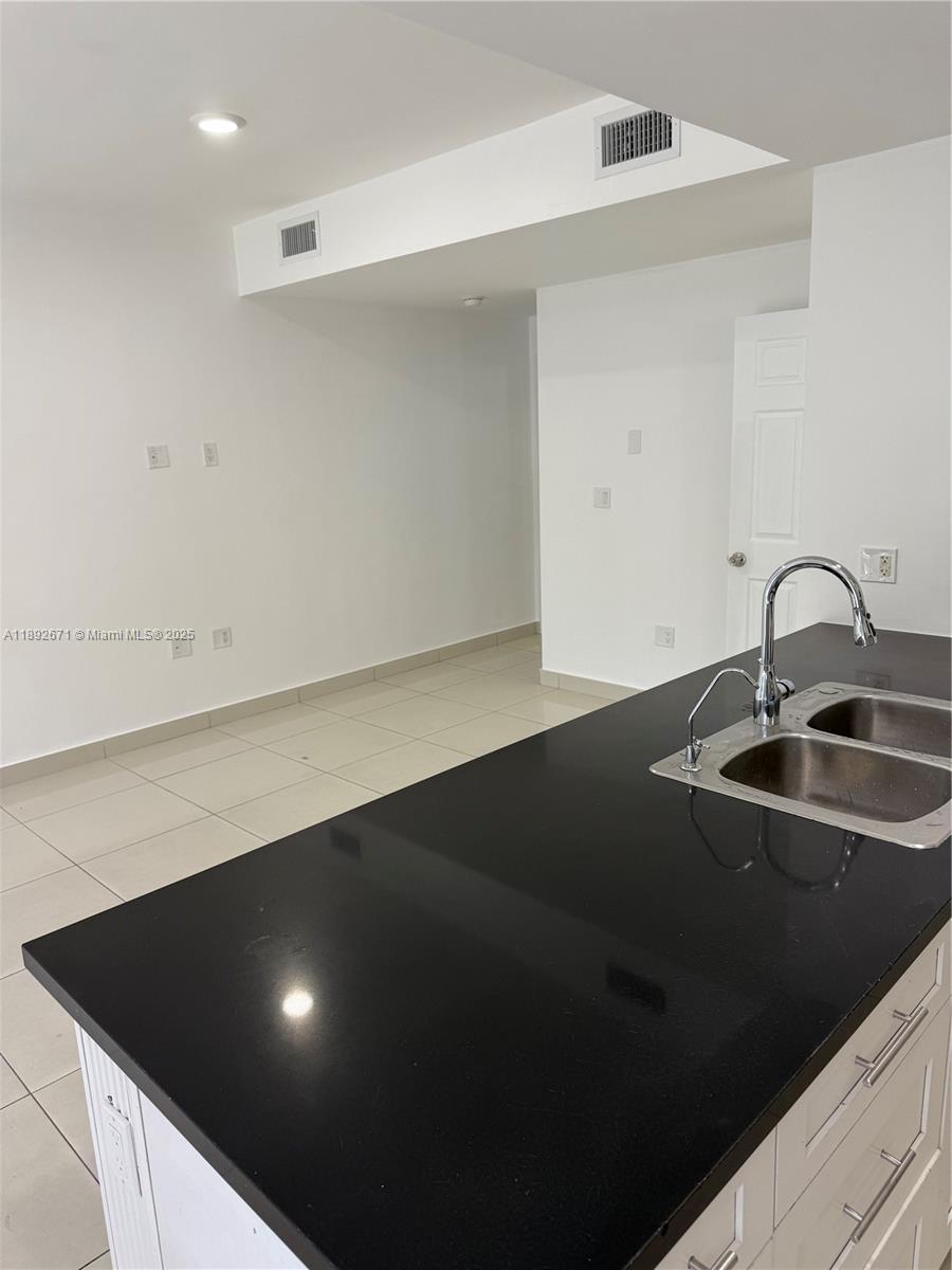 13984 Southwest 259th Street, Unit 13984 Homestead, FL 33032 - Photo 58 of 67 a close view of sink
