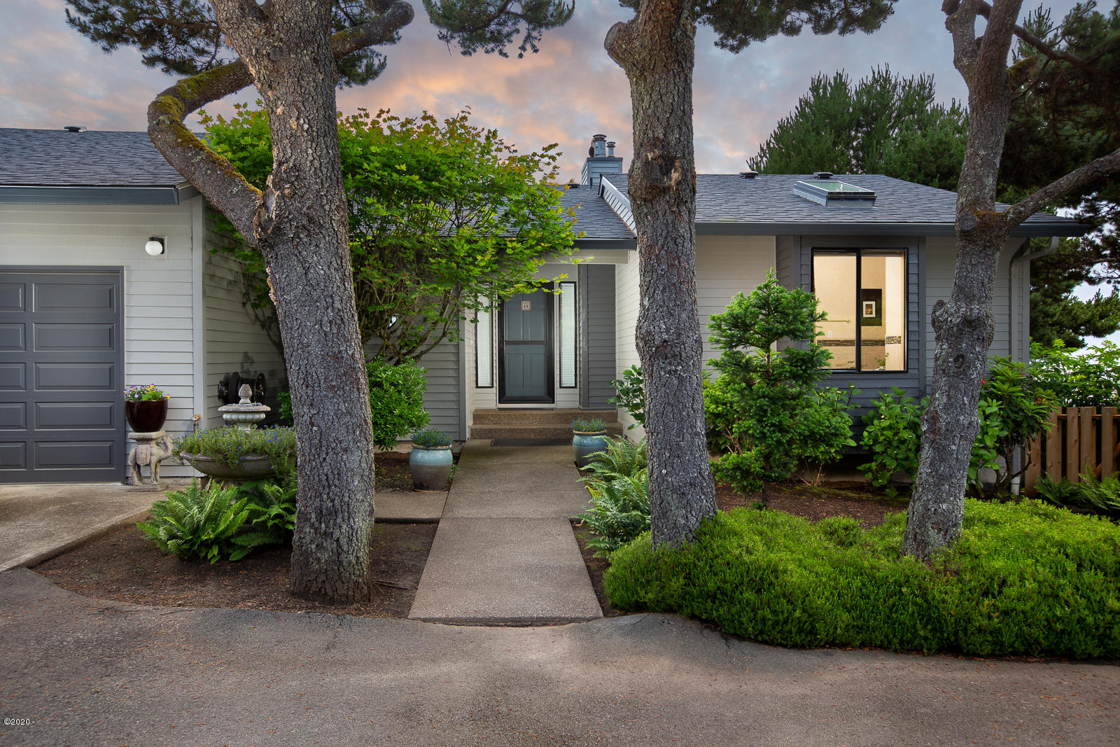 5277 Northwest Logan Road Lincoln City, OR 97367 - Photo 1 of 19 manicured entry