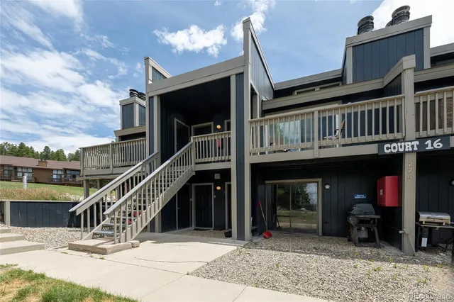 a view of a house with a deck