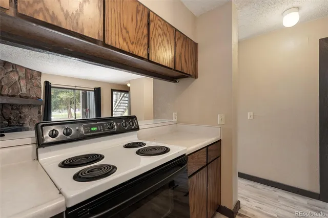 a bedroom with two beds and a dresser