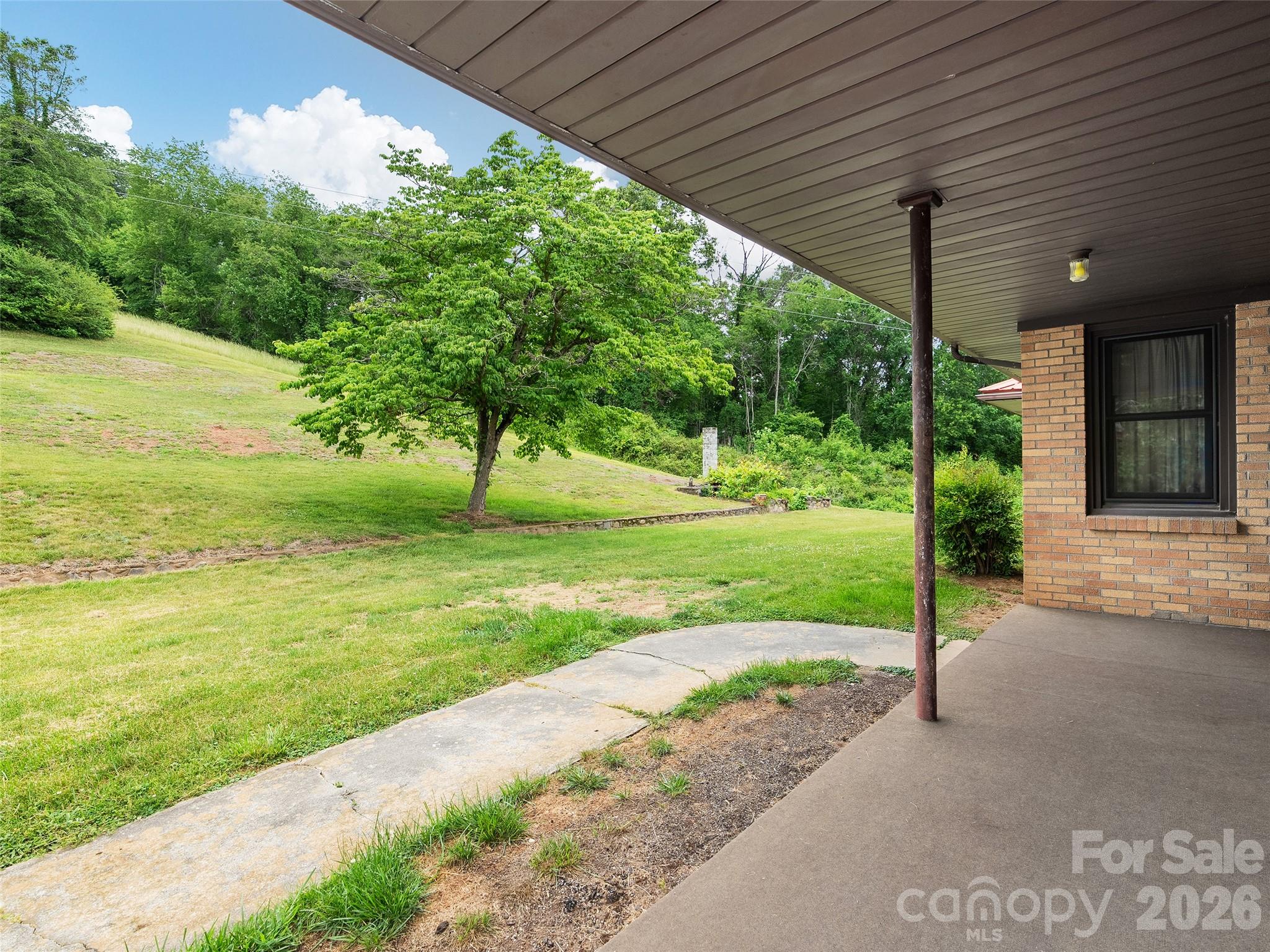 21 Beaverdam Road Canton, NC 28716 - Photo 5 of 24 a view of a house with a yard