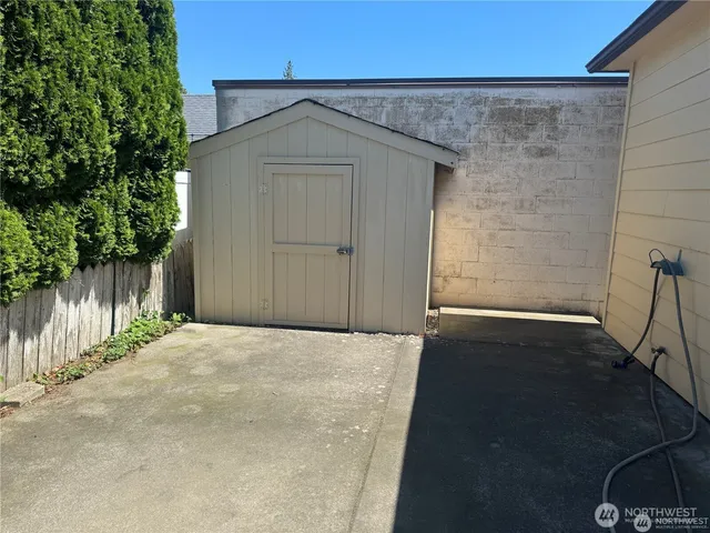 a front view of a building with garden