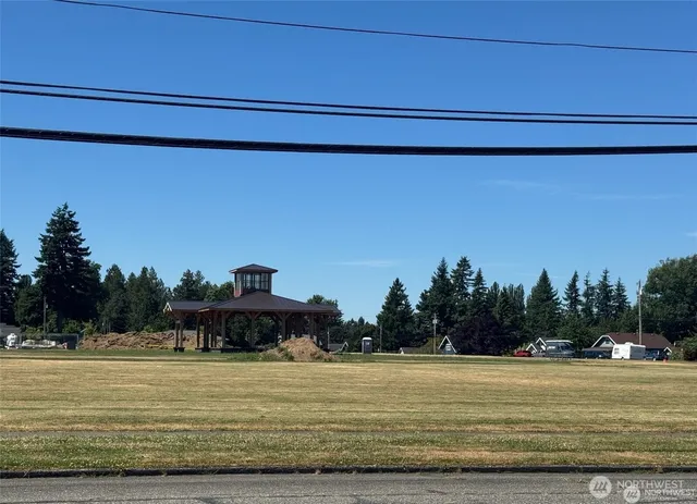 a view of a swimming pool with an outdoor seating