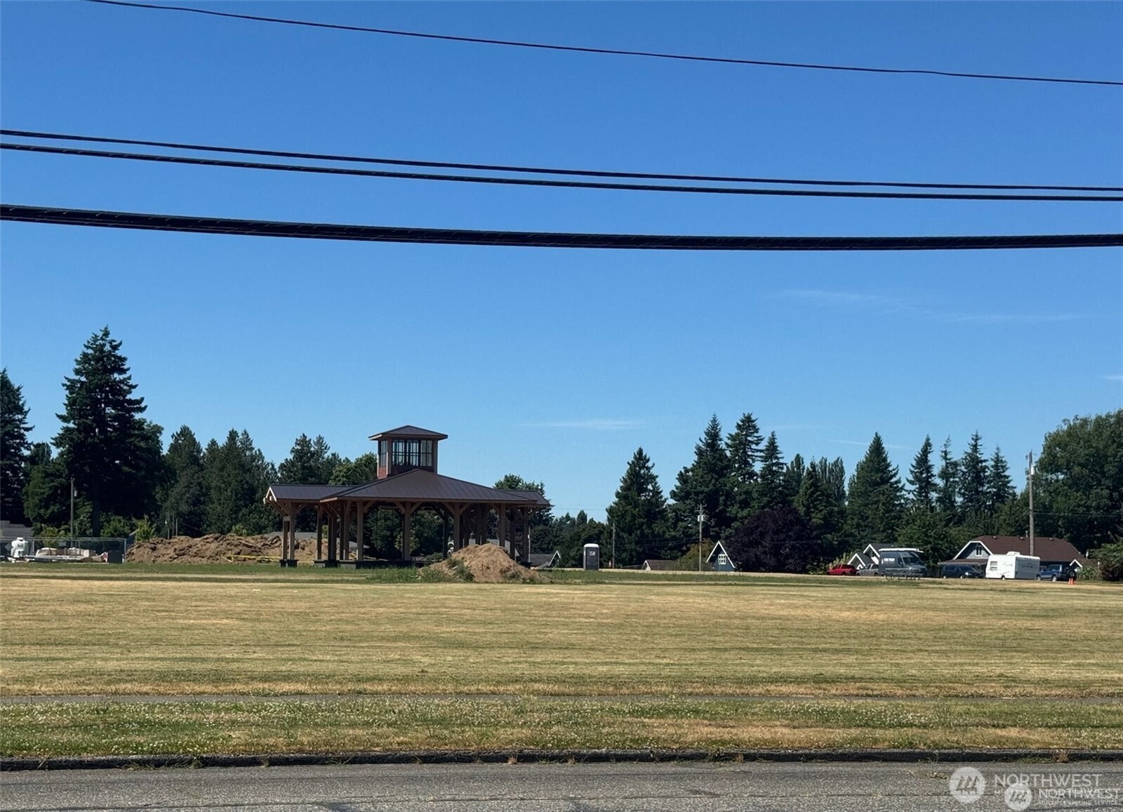 518 Edson Street Lynden, WA 98264 - Photo 4 of 31 a view of a swimming pool with an outdoor seating