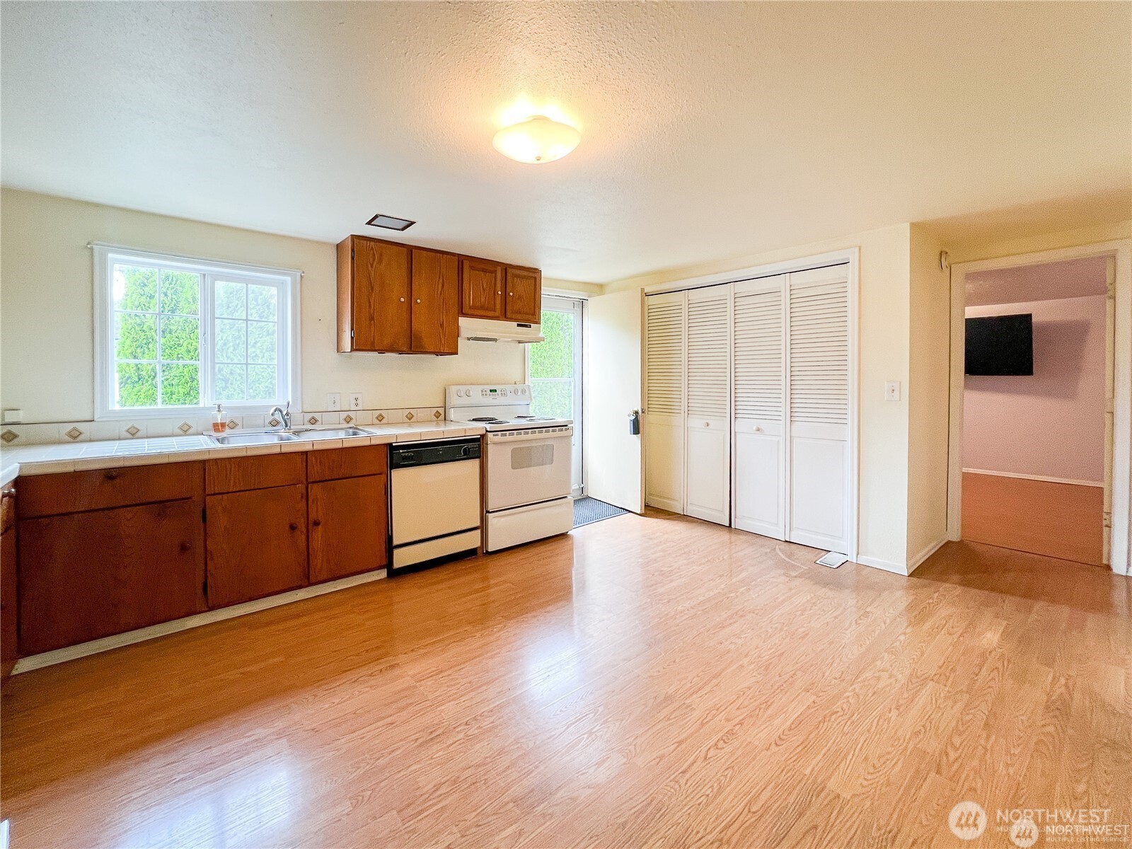 518 Edson Street Lynden, WA 98264 - Photo 6 of 31 a view of a kitchen with a sink and a window