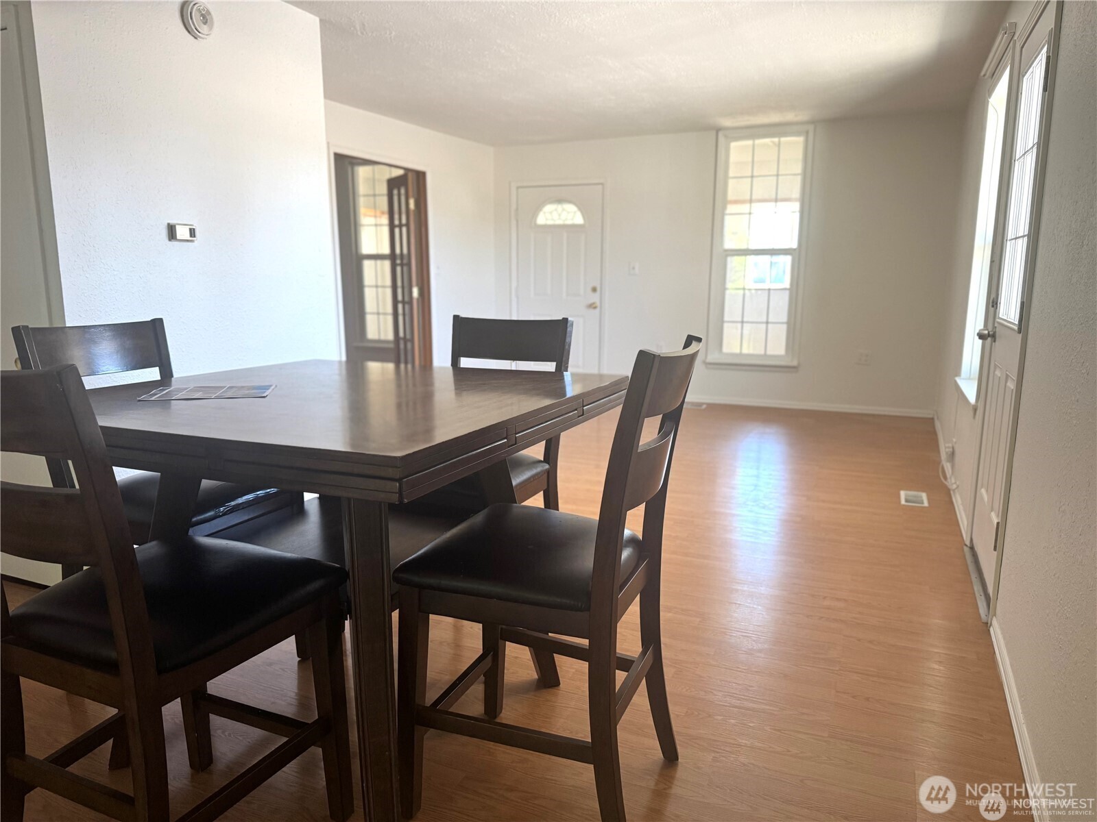 518 Edson Street Lynden, WA 98264 - Photo 9 of 31 a view of a dining room with furniture and window
