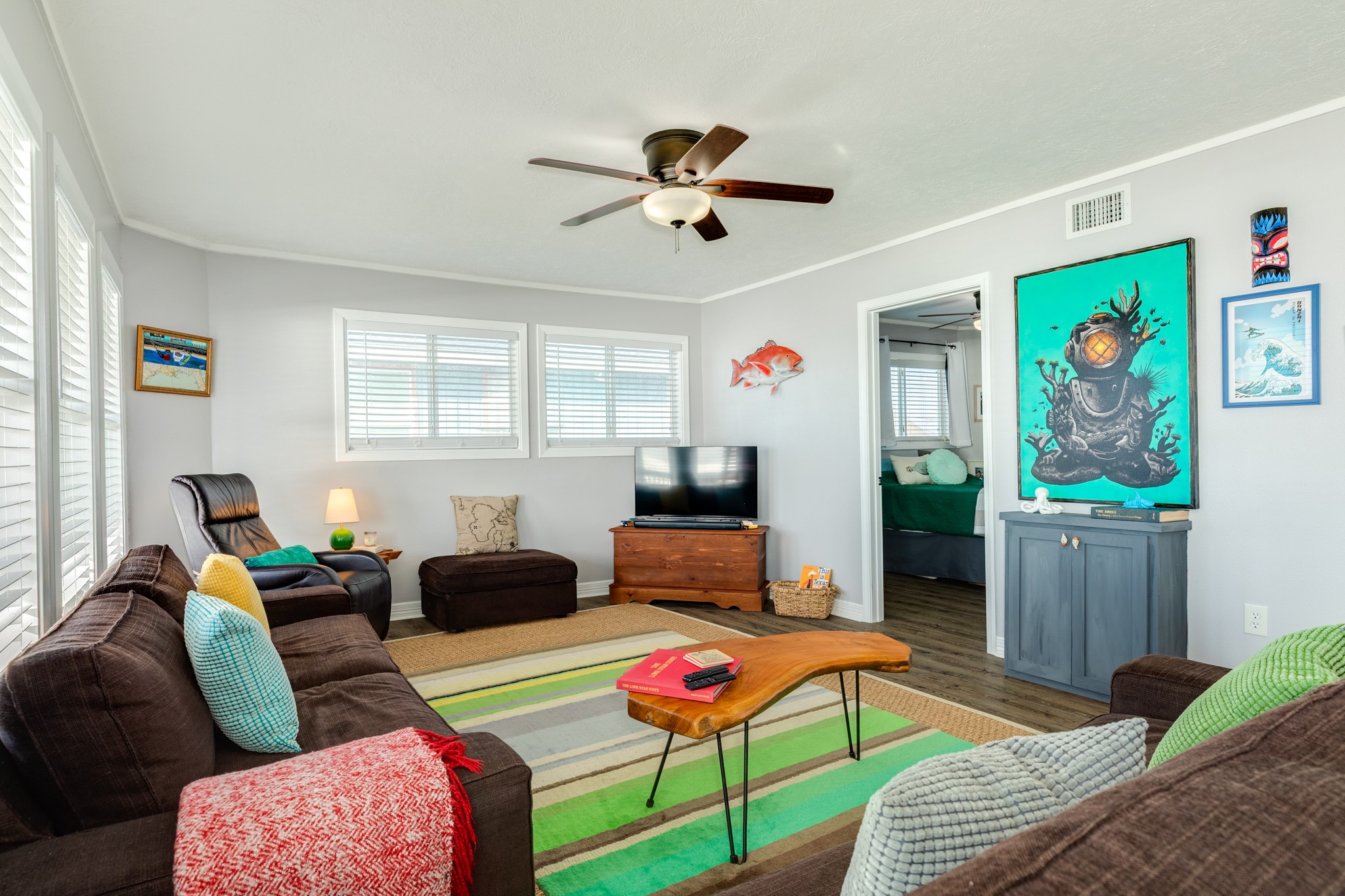 722 Beach Drive Surfside Beach, TX 77541 - Photo 12 of 34 a living room with furniture and a window