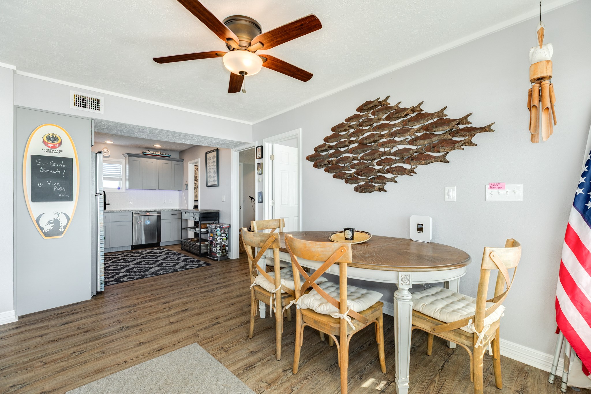 722 Beach Drive Surfside Beach, TX 77541 - Photo 13 of 34 a dining room with furniture and window