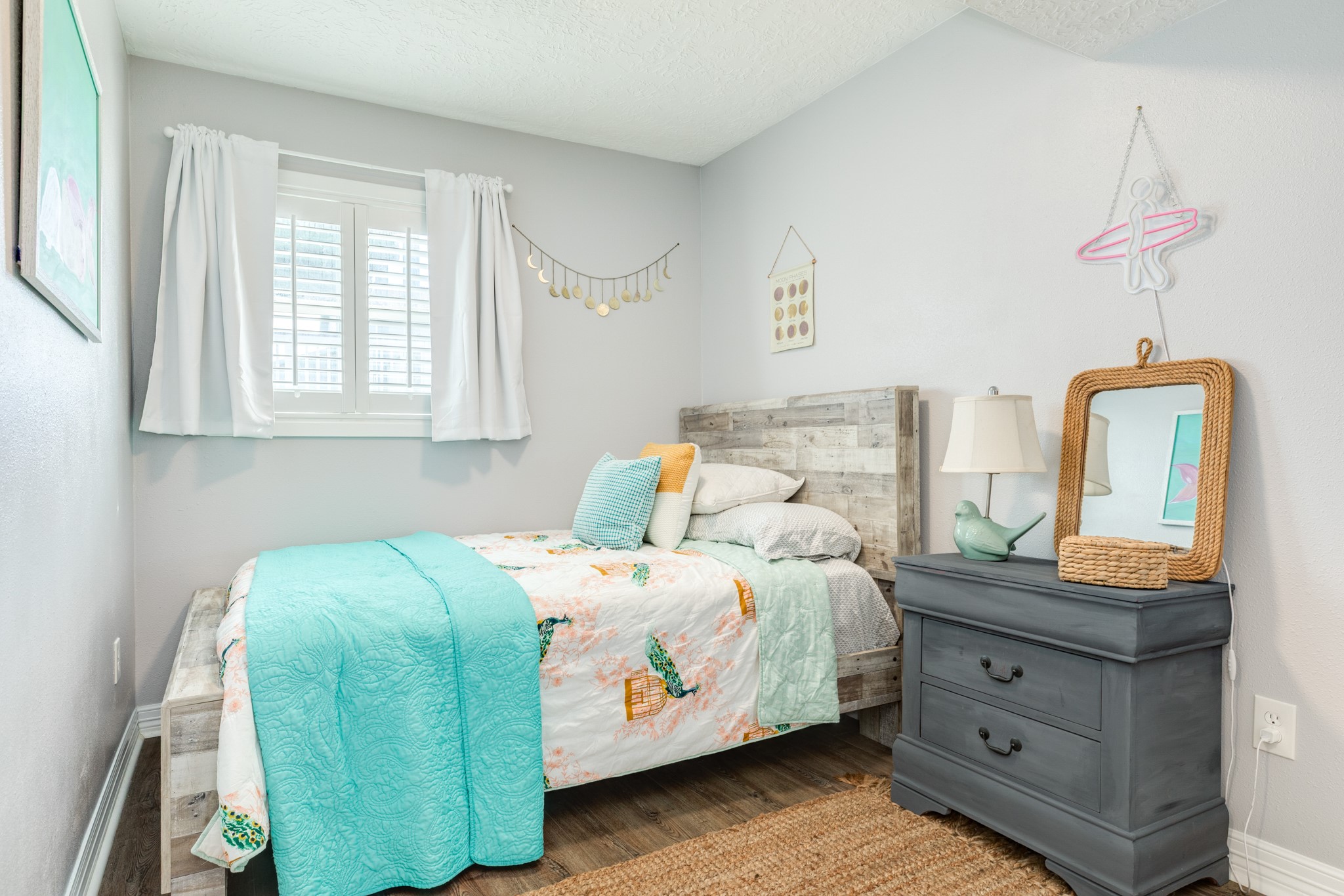 722 Beach Drive Surfside Beach, TX 77541 - Photo 20 of 34 a bedroom with a bed and a table