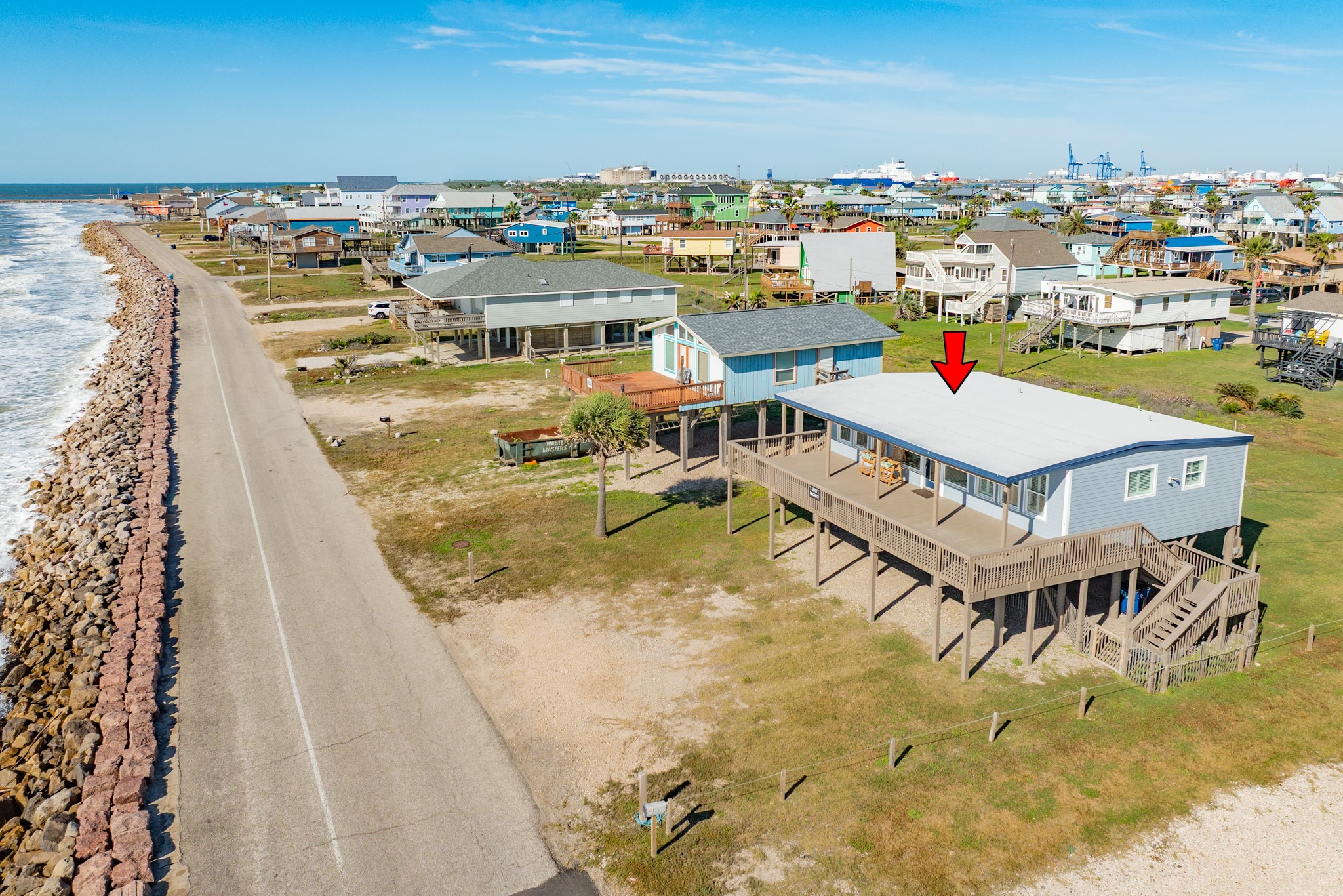 722 Beach Drive Surfside Beach, TX 77541 - Photo 23 of 34 a view of a swimming pool with outdoor seating