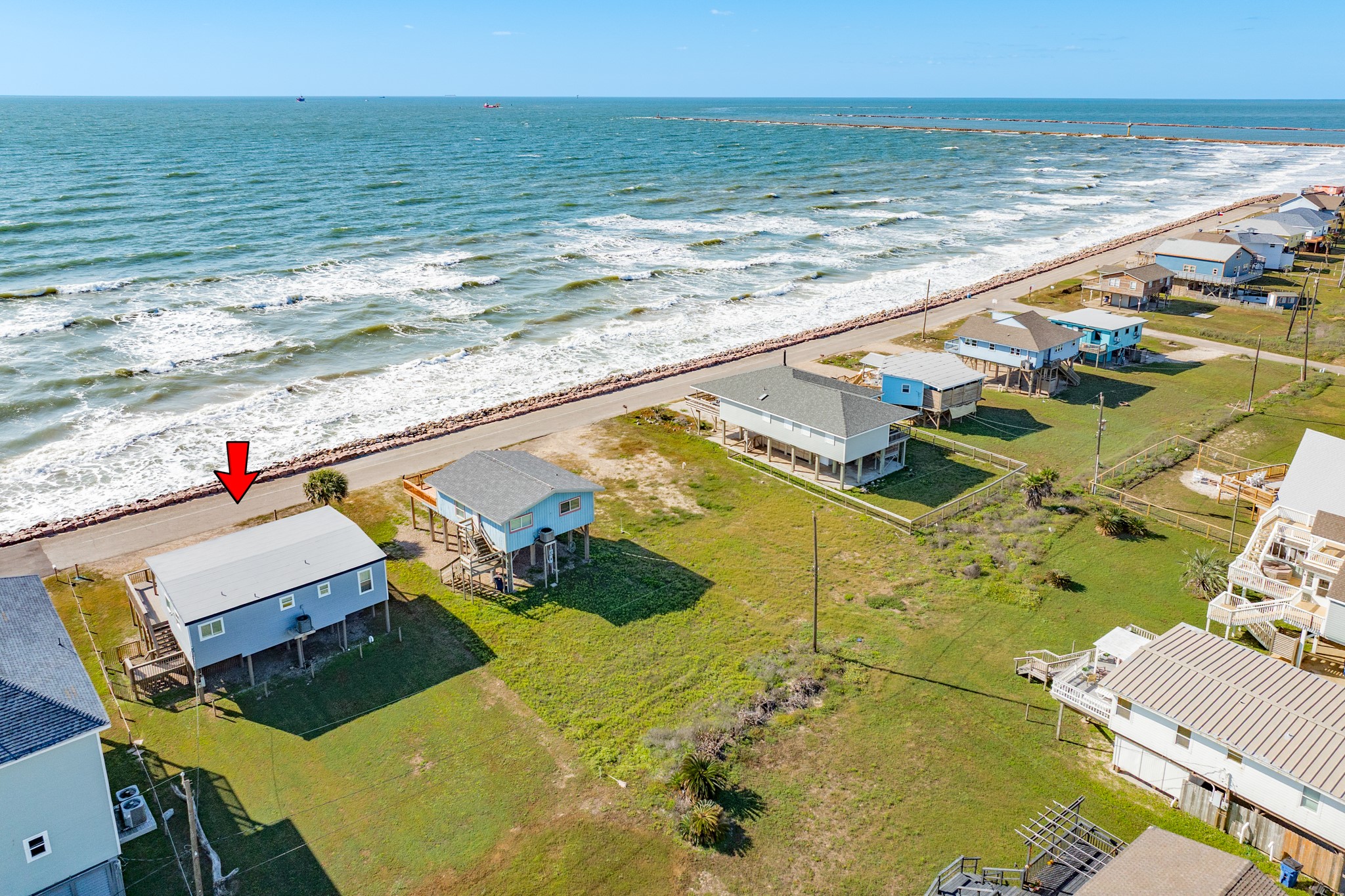722 Beach Drive Surfside Beach, TX 77541 - Photo 25 of 34 a view of an ocean and beach