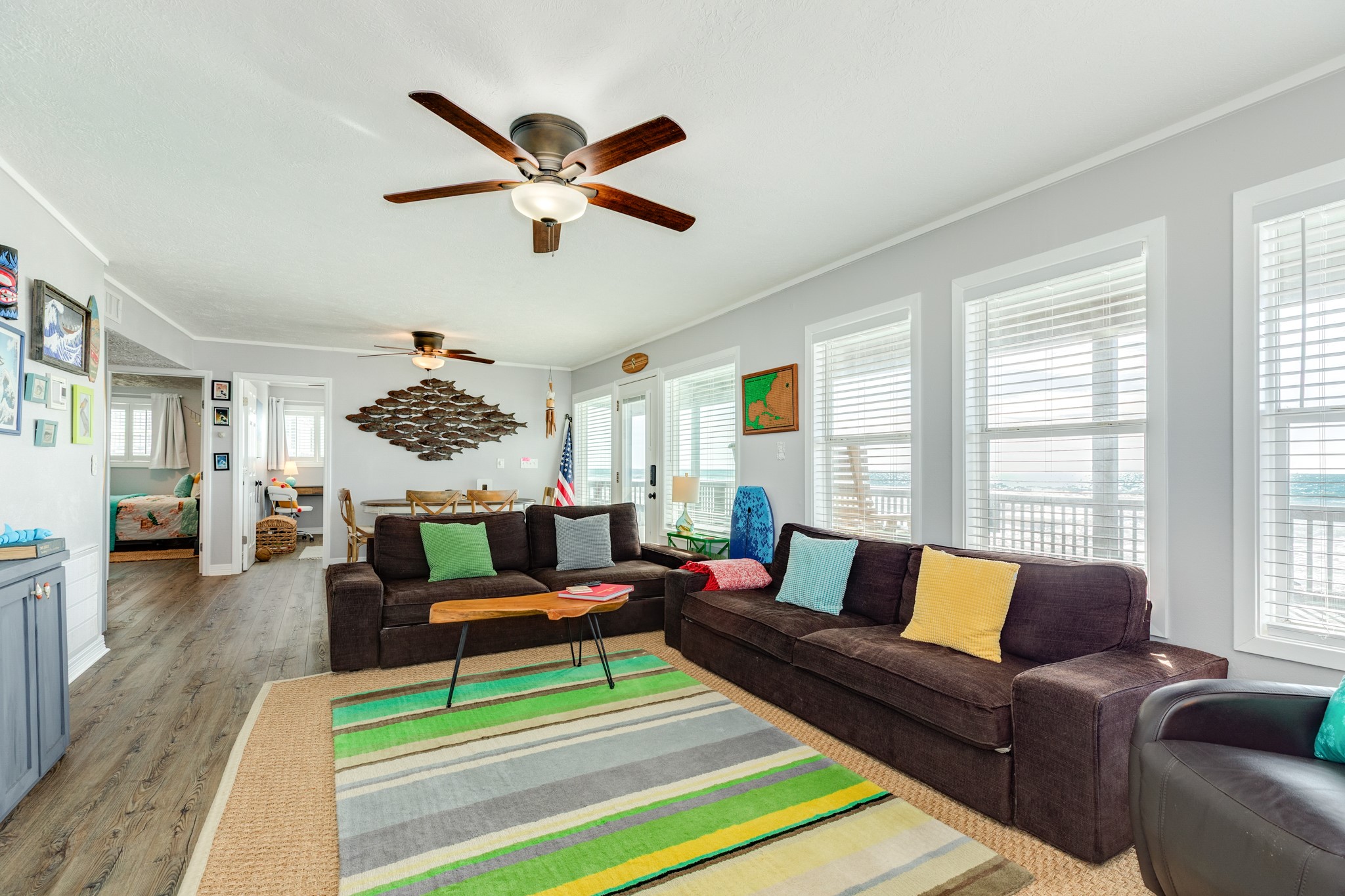 722 Beach Drive Surfside Beach, TX 77541 - Photo 3 of 34 a living room with furniture and a large window