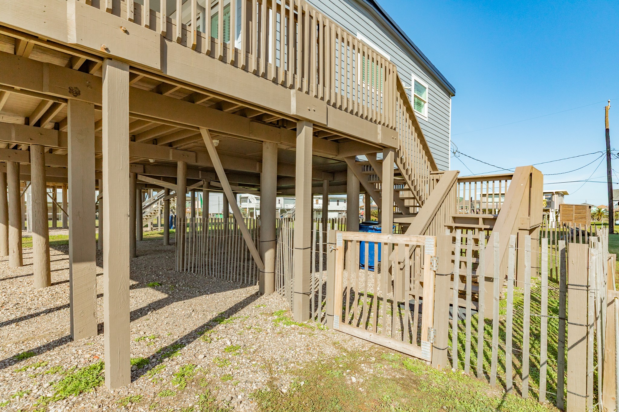 722 Beach Drive Surfside Beach, TX 77541 - Photo 33 of 34 a view of a building with a glass door