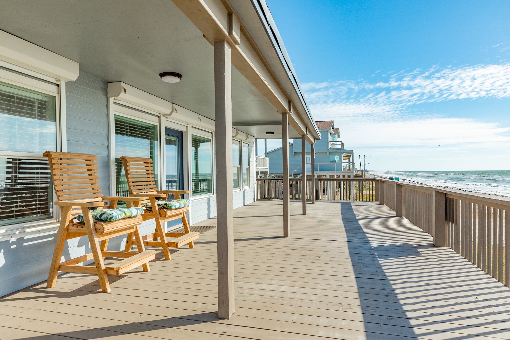 722 Beach Drive Surfside Beach, TX 77541 - Photo 8 of 34 a view of balcony with seating space and wooden floor