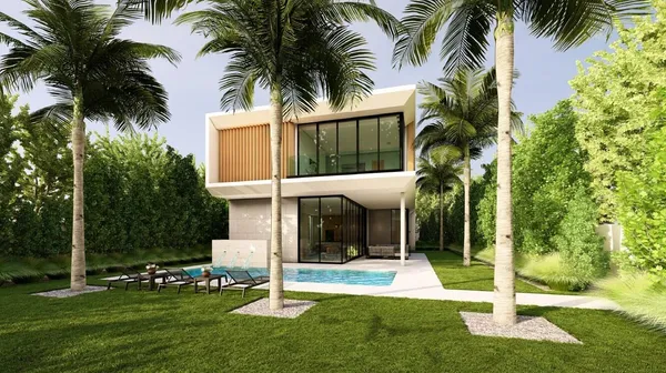 a view of a house with a yard and palm trees