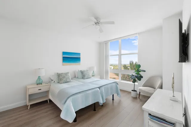 a bedroom with a bed and a couch