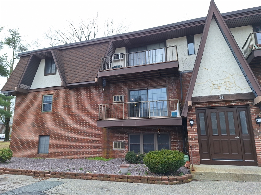 39 West Street, Unit B1 Randolph, MA 02368 - Photo 2 of 15 a front view of a house